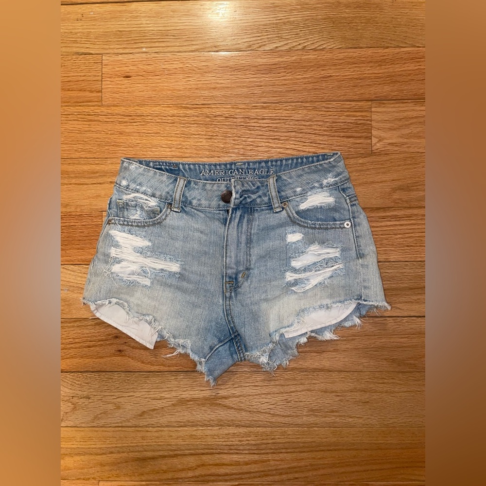 American Eagle denim shorts size 00 light wash blue with rips
